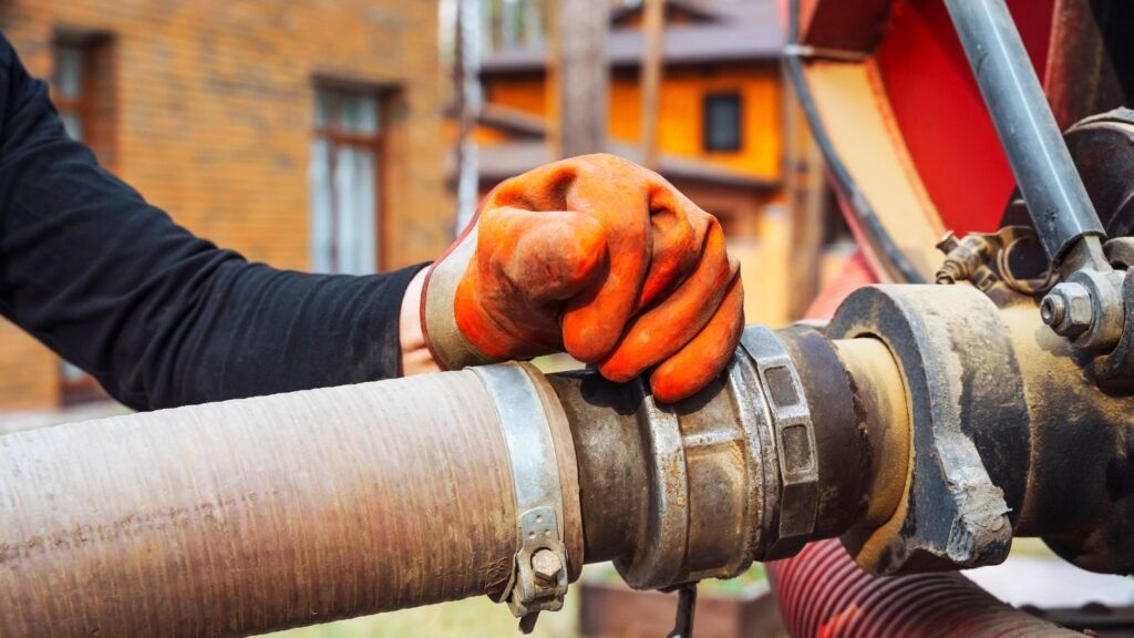 Gully bowser hose connected for waste water tank cleaning